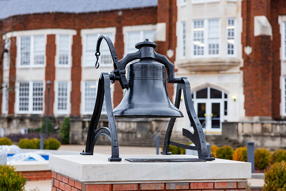 The bell in front of Angle Hall