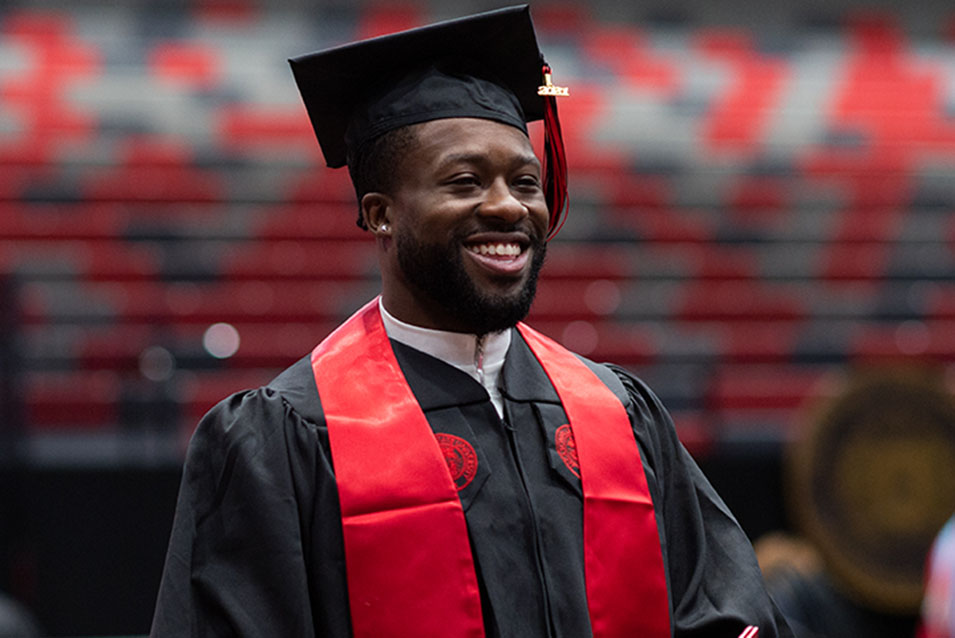 Student at graduation finishing his degree