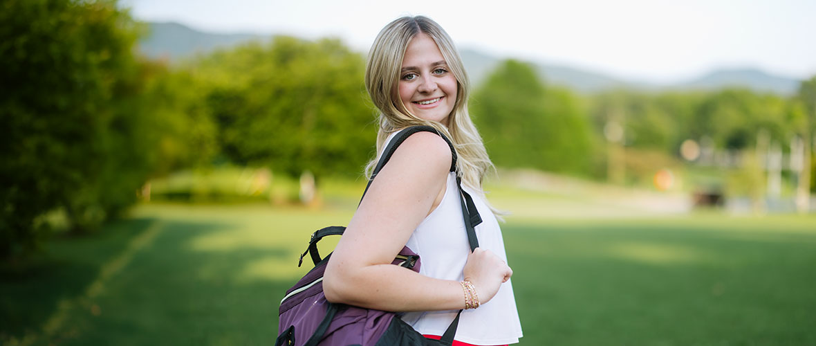 Student carrying backpack