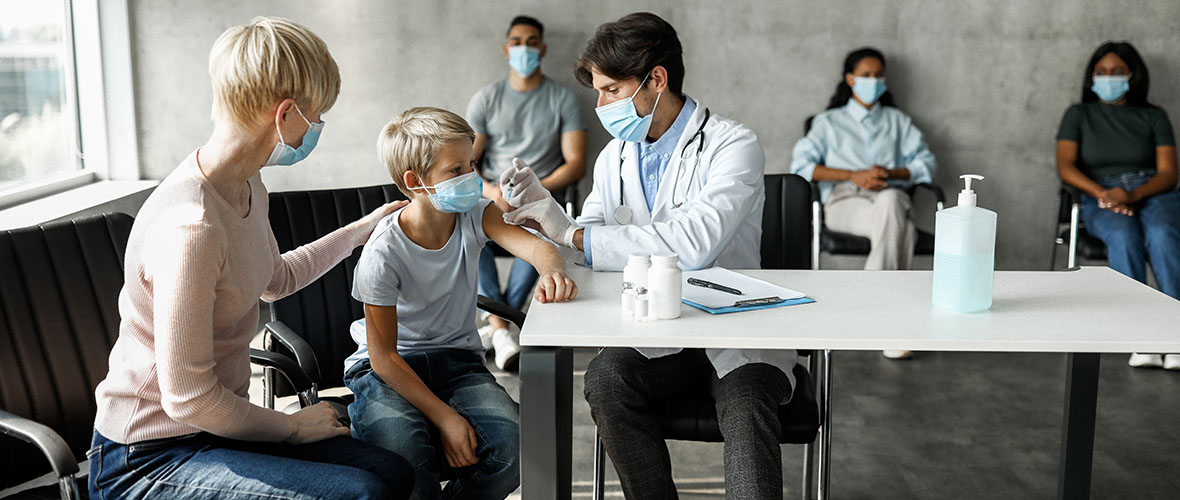 Young child getting shot from nurse