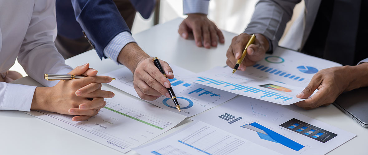 Employees working with papers