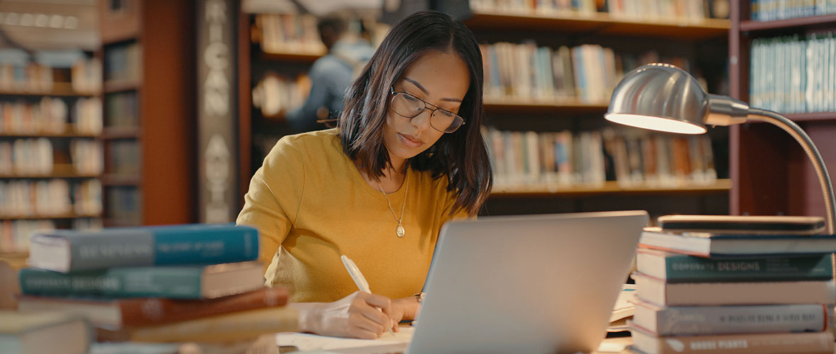 Graduate student working at desk