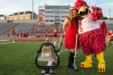 Student With Cocky at football stadium