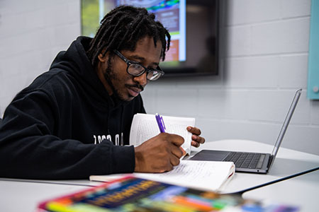 Male student taking a test