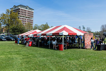 Student taking notes at a Financial Aid Workshop