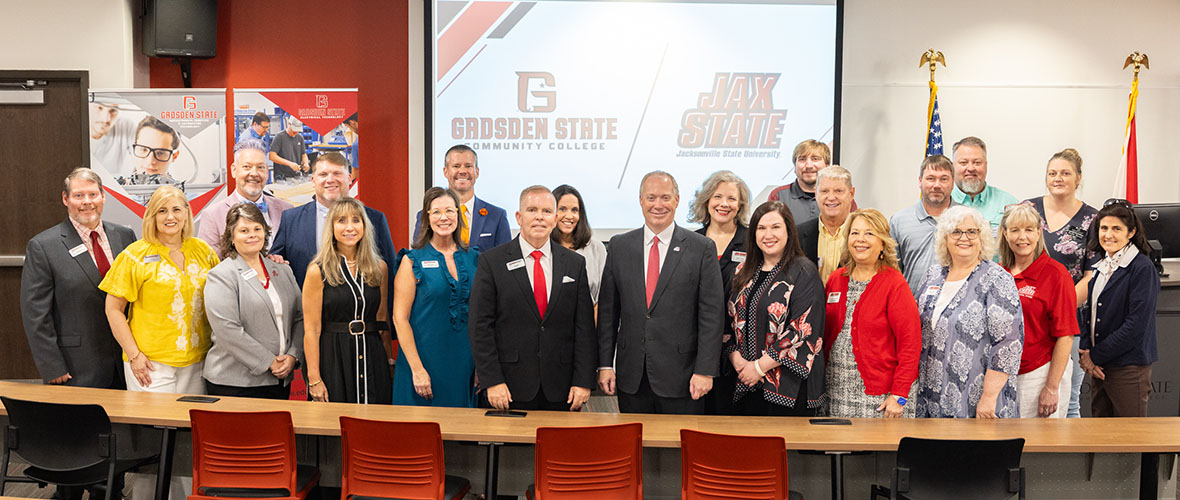 Jacksonville State University and Gadsden State Community College key members smiling for a photo